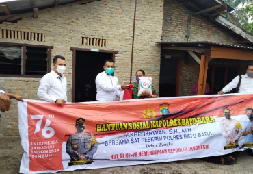 Satreskrim Salurkan Bantuan Kapolres Batu Bara di Desa Tanah Merah