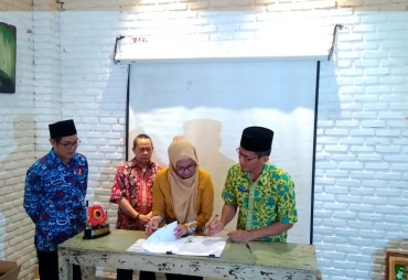 Penandatanganan Berita Acara Rekonsiliasi Data Iuran Wajib PNS Daerah