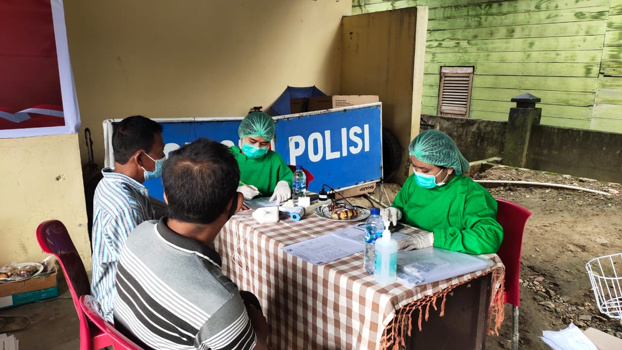 Polsek Mardingding Gelar Vaksinasi Massal di Dua Kecamatan