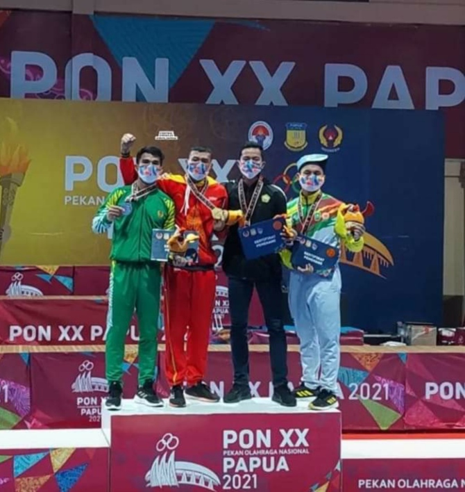 Roberto Manik Berhasil Meraih Medali Perak Kelas 70 kg Cabor Wushu