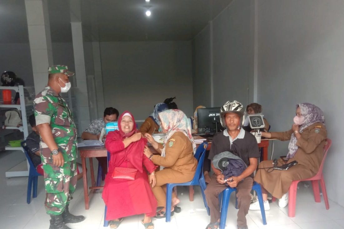 Polsek Sei Kepayang Vaksinasi Covid-19 Dosis I dan II di Dsn II Desa Sei Kepayang Tengah