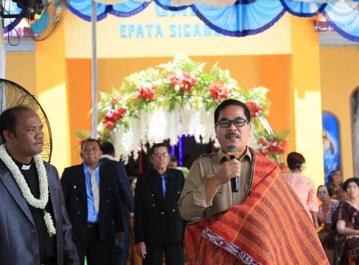 Kaban Bappeda Sampaikan Pidato Bupati Labuhanbatu Dalam Acara Peresmian GMI