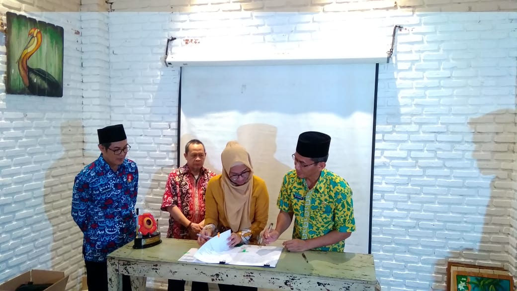 Penandatanganan Berita Acara Rekonsiliasi Data Iuran Wajib PNS Daerah