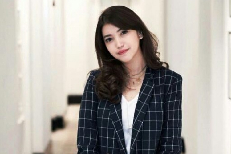 Dewi Paramita, SH