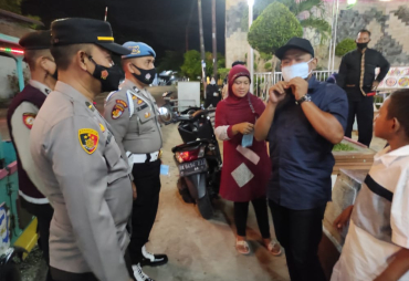 Polres Asahan Berikan Teguran dan Bagikan Masker Kepada Pengguna Jalan