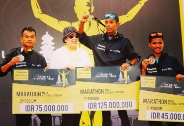 Pratu Wilman Pasaribu personil 121/Mk Brigif 7 /Rimba Raya, Kodam I/BB meraih perak saat ikuti ajang internasional lomba Maybank Marathon tahun 2019 di Bali.(TO/ Ist)